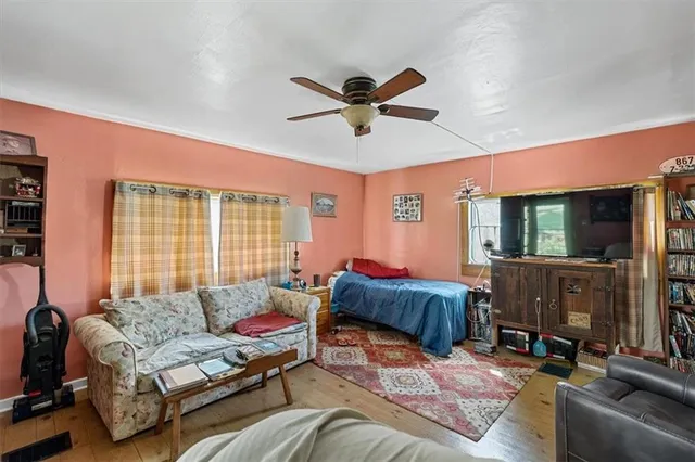a very nice looking dining room with a large window
