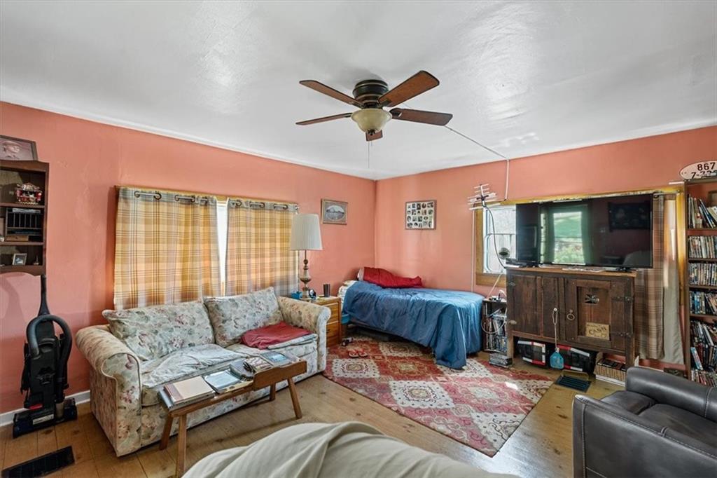 1182 Airport Road Aliquippa, PA 15001 - Photo 14 of 25 a living room with furniture and a window
