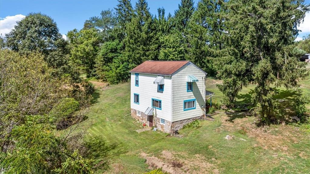 1182 Airport Road Aliquippa, PA 15001 - Photo 2 of 25 a house view with a outdoor space