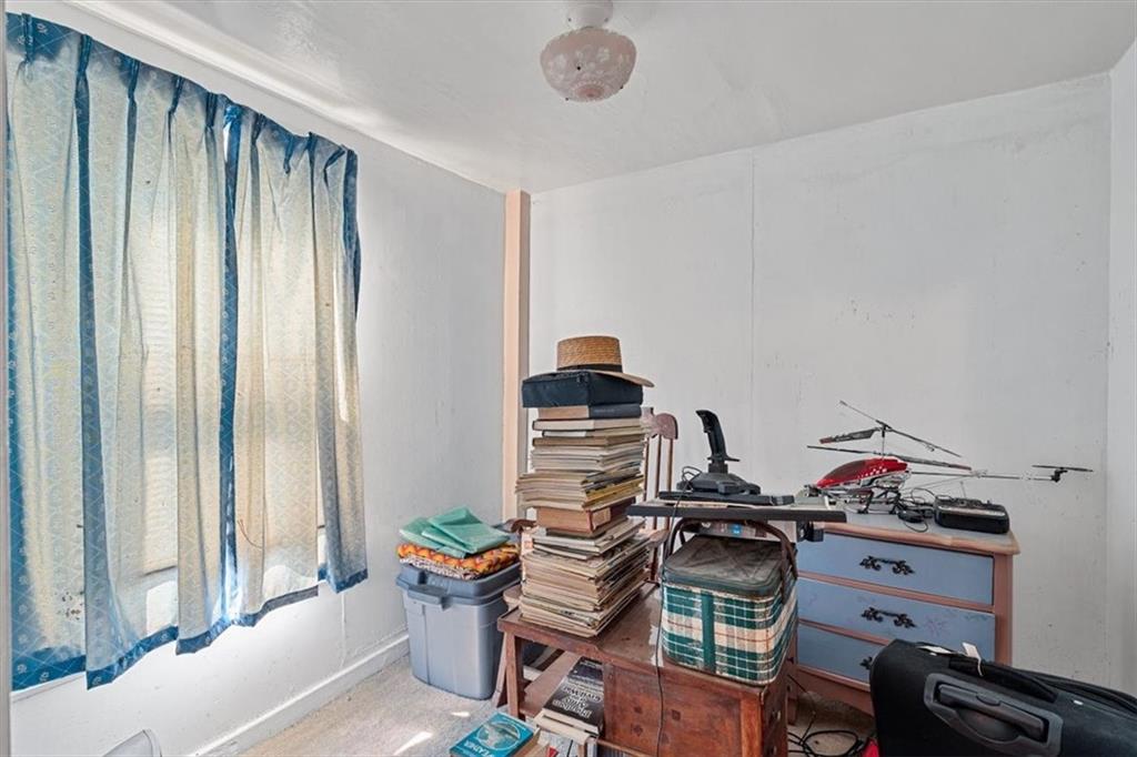 1182 Airport Road Aliquippa, PA 15001 - Photo 22 of 25 a view of a workspace with furniture and a window