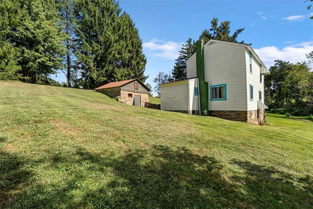 1182 Airport Road Aliquippa, PA 15001 - Photo 3 of 25 a view of a house with a yard
