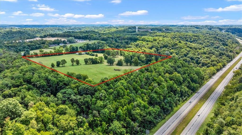 1182 Airport Road Aliquippa, PA 15001 - Photo 5 of 25 a view of a city with lush green forest