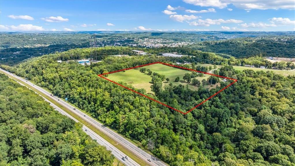 1182 Airport Road Aliquippa, PA 15001 - Photo 6 of 25 an aerial view of residential houses with outdoor space and trees