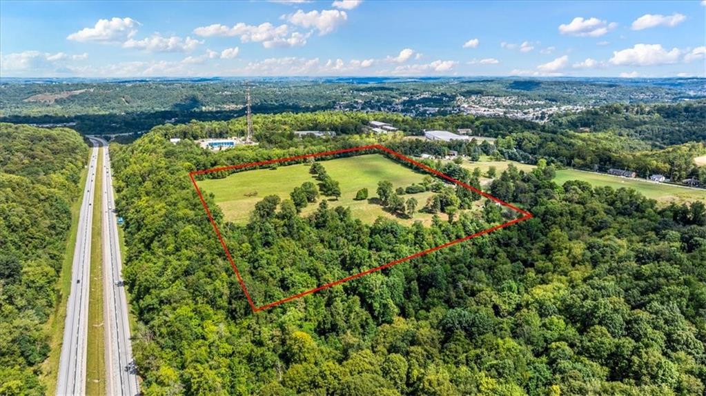 1182 Airport Road Aliquippa, PA 15001 - Photo 7 of 25 an aerial view of residential houses with outdoor space and trees