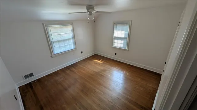 an empty room with windows