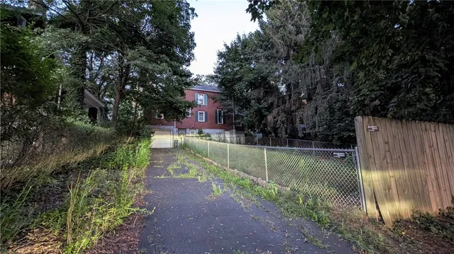 a view of a lake with a yard