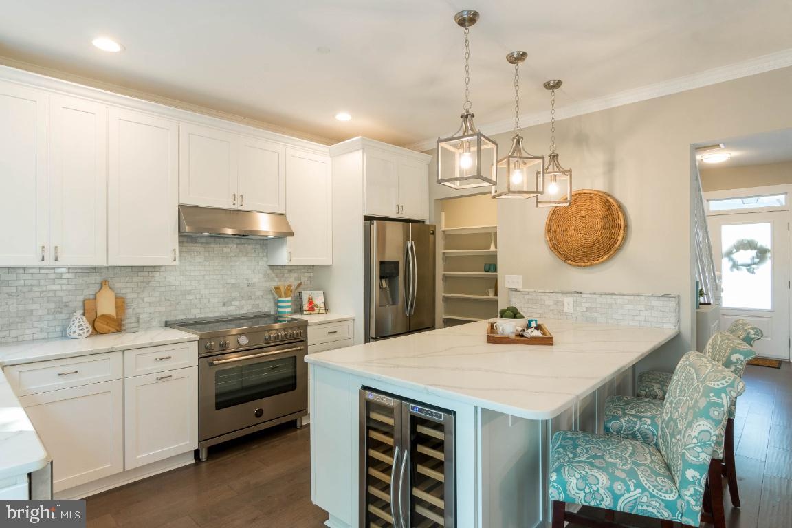 833 Bay Ridge Avenue Annapolis, MD 21403 - Photo 9 of 43 Kitchen with Quartz Countertops and Wine Fridge