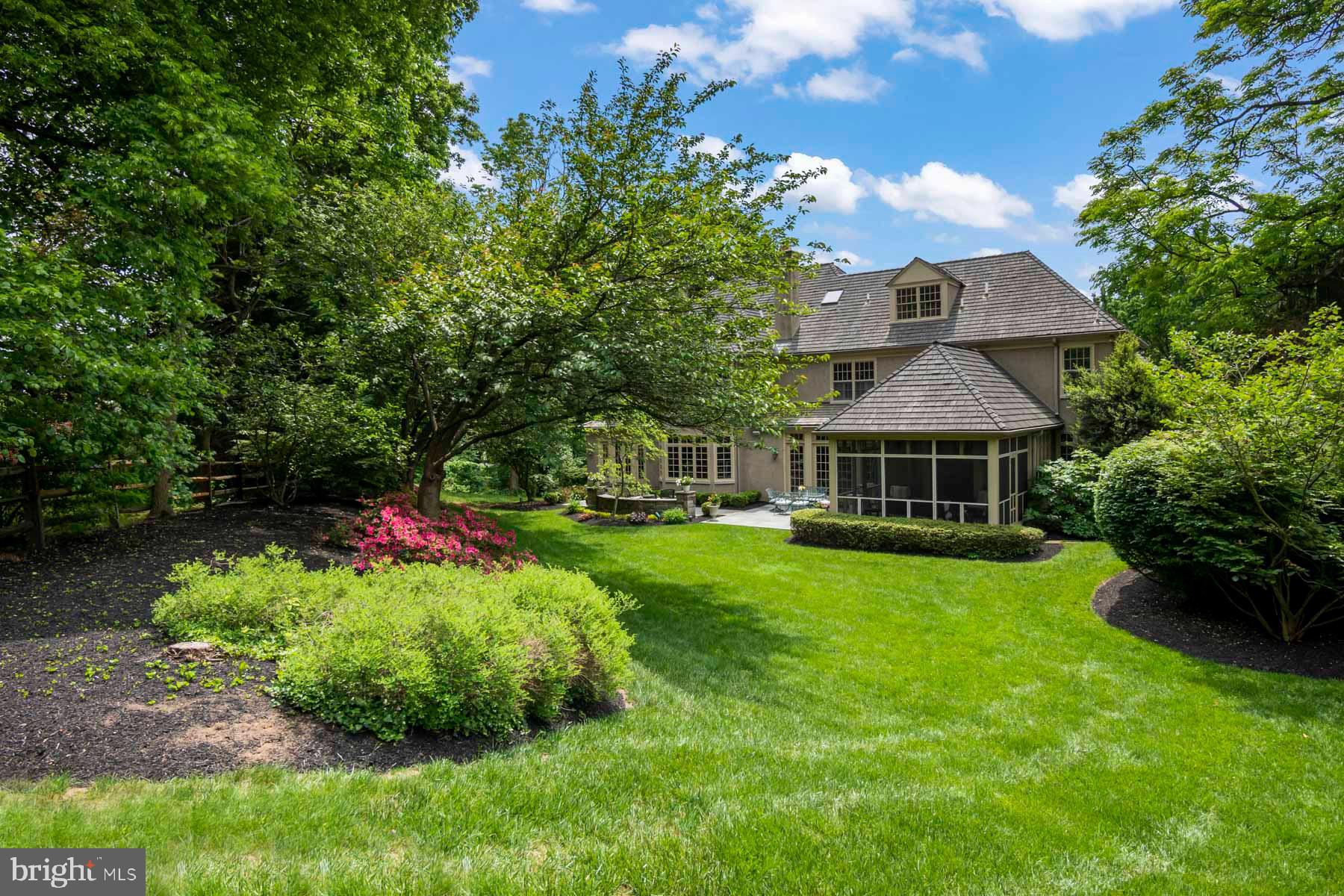 2 Matlack Lane Villanova, PA 19085 - Photo 16 of 83 a front view of a house with a garden