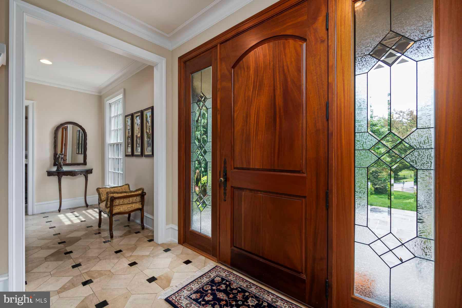 2 Matlack Lane Villanova, PA 19085 - Photo 19 of 83 a view of a hallway to a livingroom with furniture