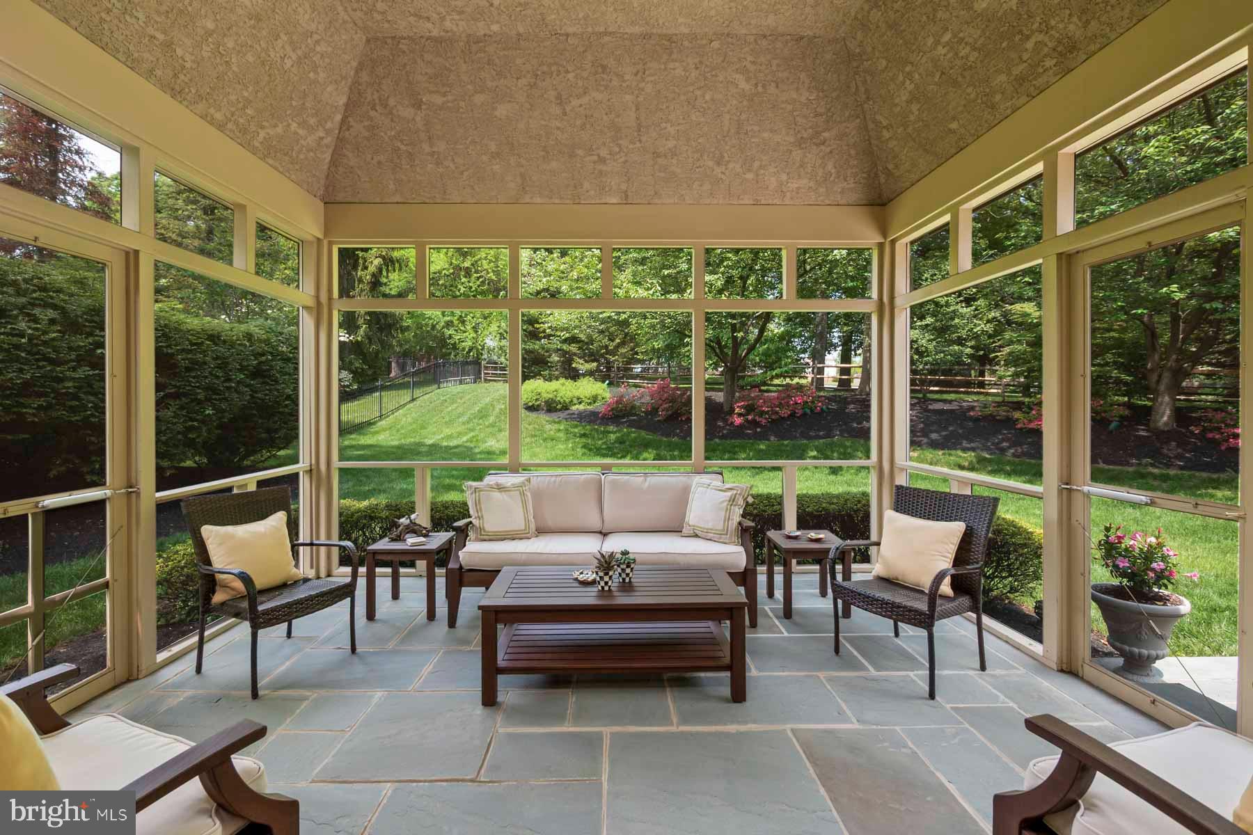 2 Matlack Lane Villanova, PA 19085 - Photo 43 of 83 a living room with furniture and floor to ceiling windows