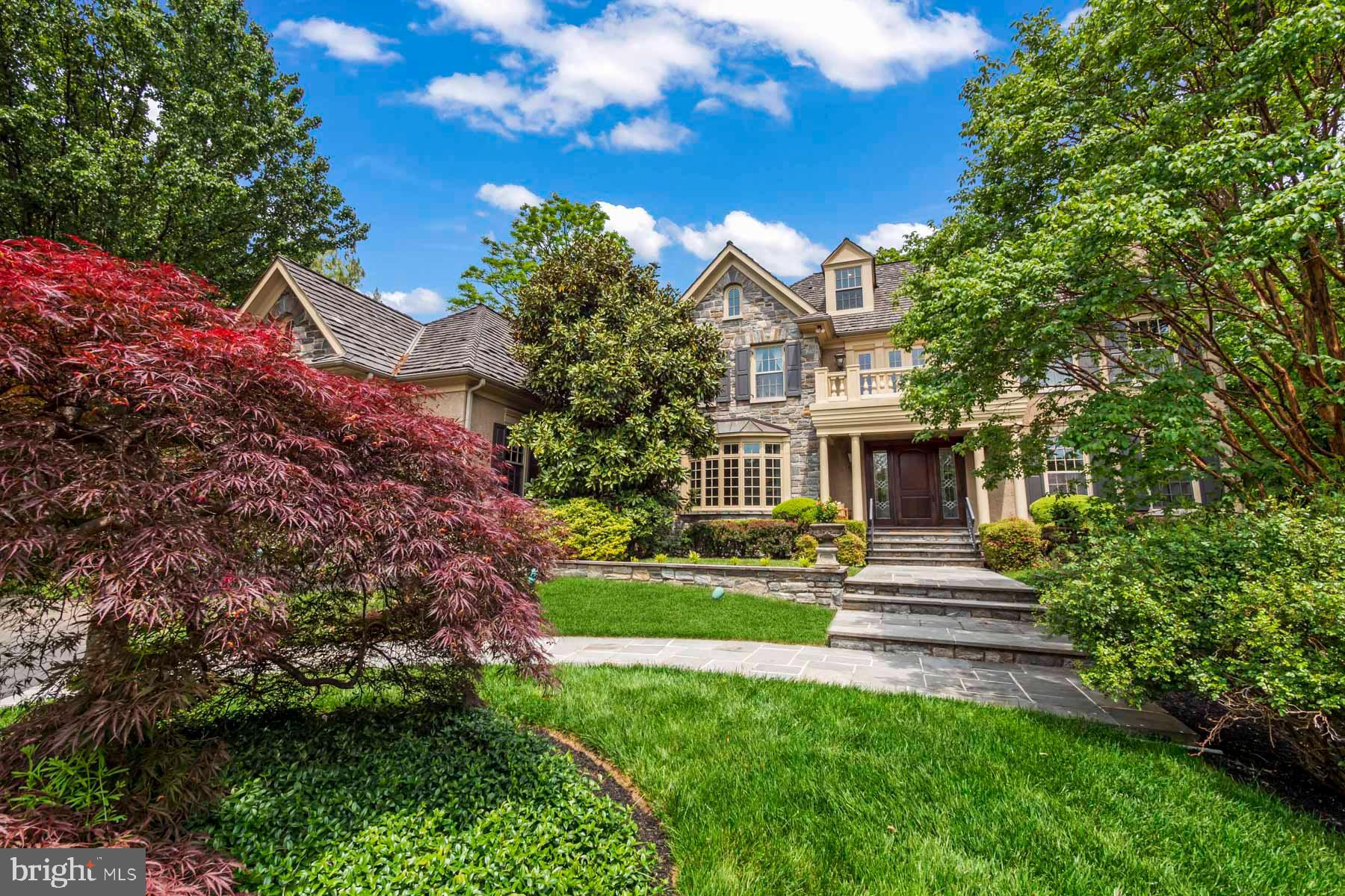 2 Matlack Lane Villanova, PA 19085 - Photo 5 of 83 a front view of a house with a yard