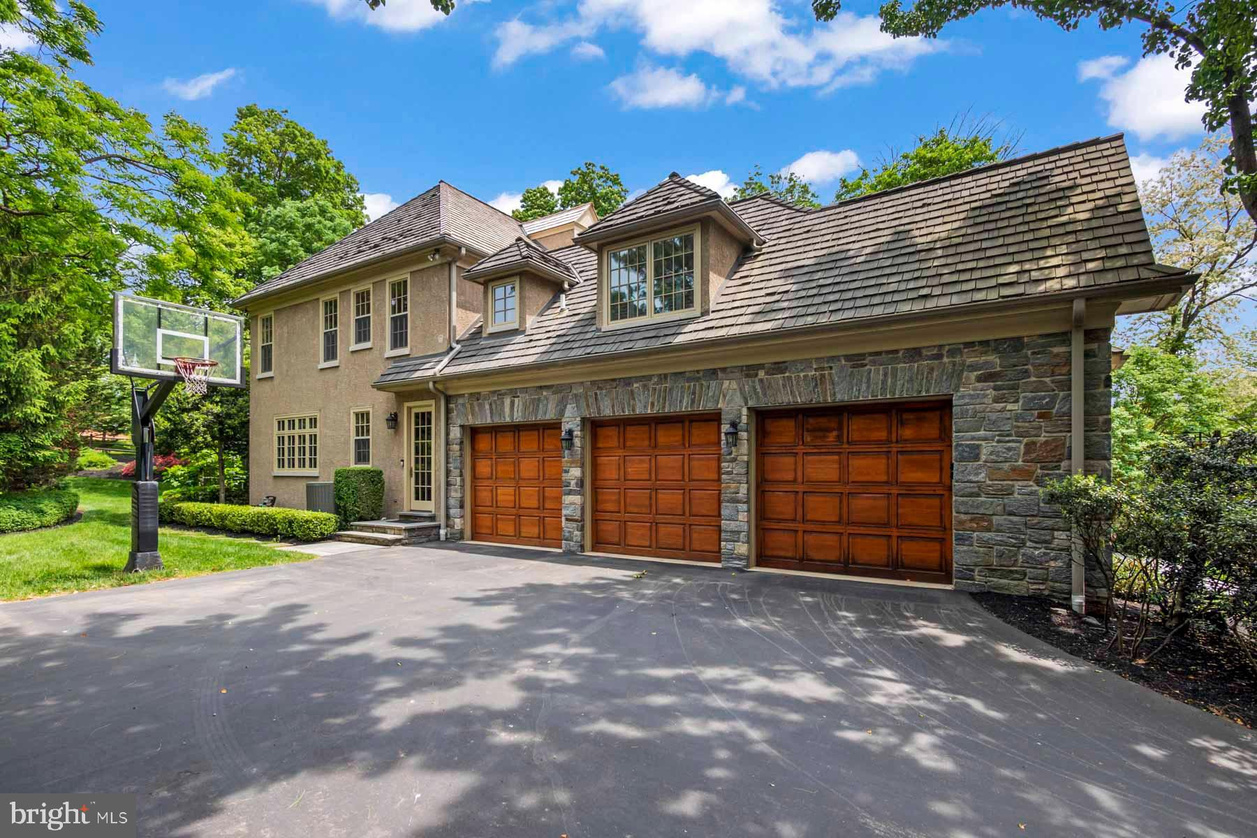 2 Matlack Lane Villanova, PA 19085 - Photo 6 of 83 a front view of a house with a yard