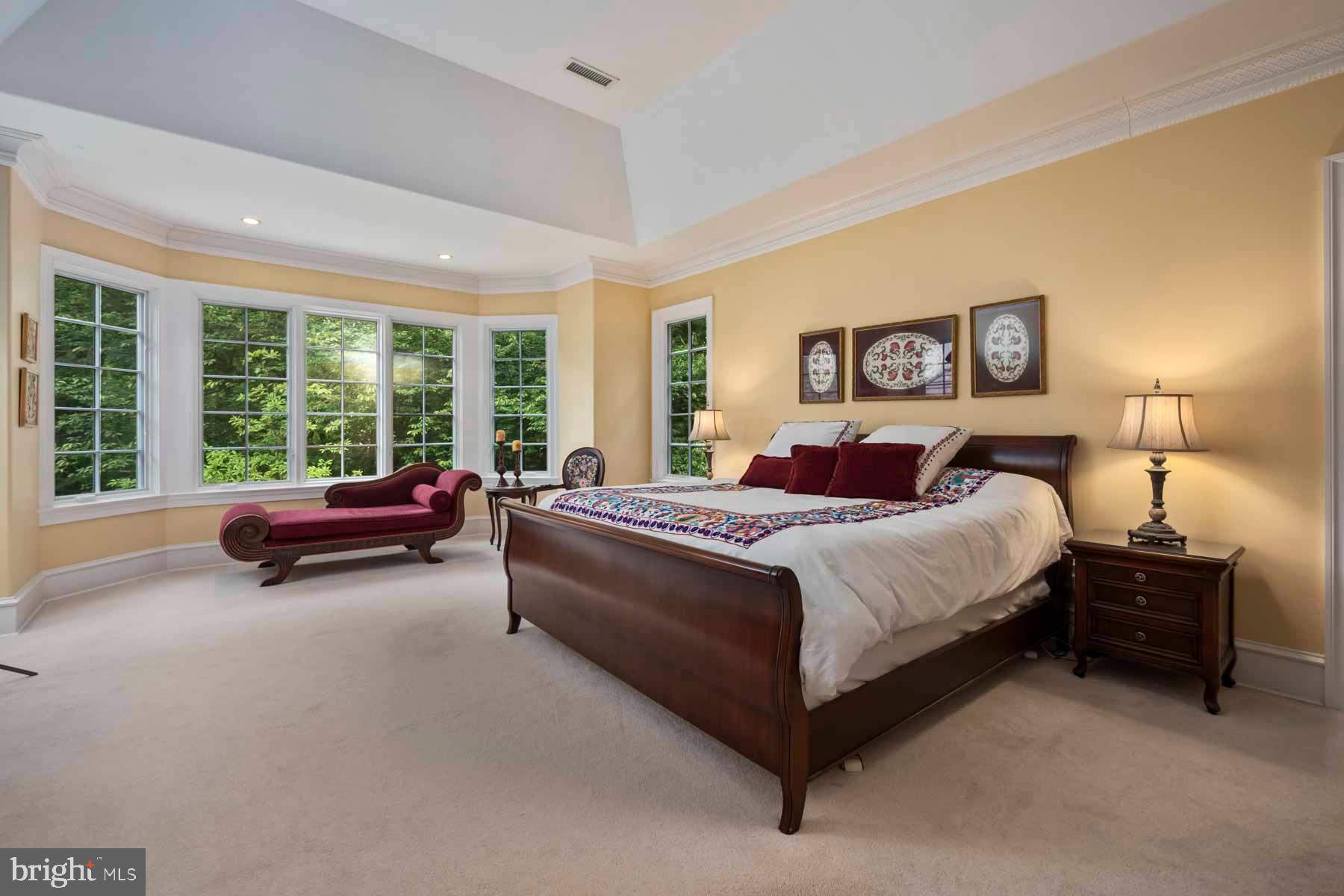2 Matlack Lane Villanova, PA 19085 - Photo 62 of 83 a spacious bedroom with a bed and a couch