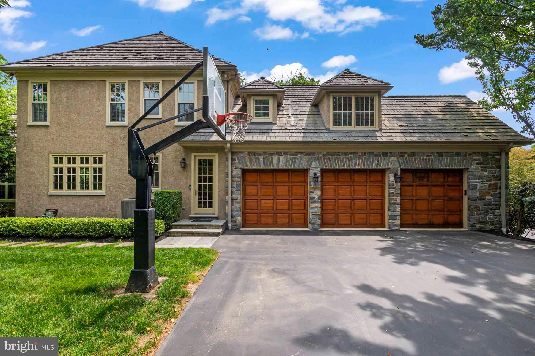 2 Matlack Lane Villanova, PA 19085 - Photo 7 of 83 a front view of a house with a garden