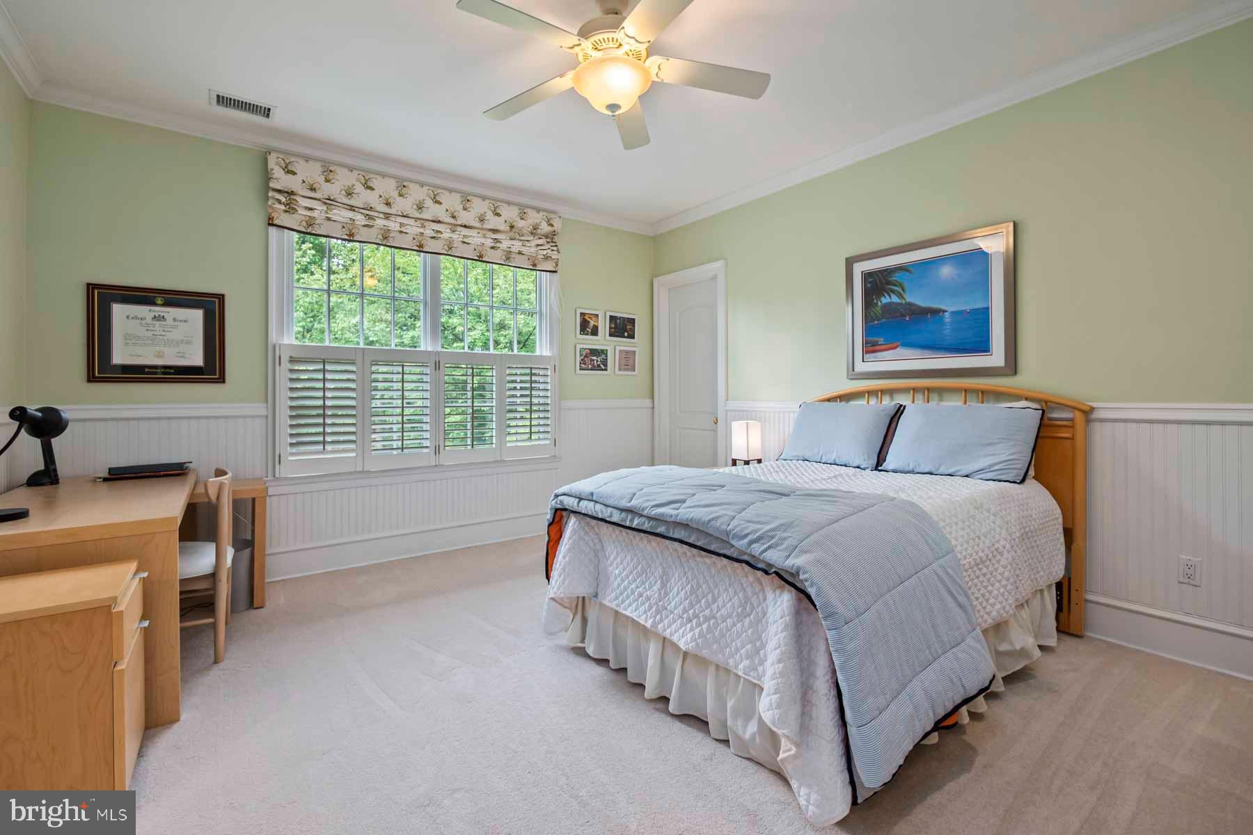 2 Matlack Lane Villanova, PA 19085 - Photo 78 of 83 a bedroom with a bed and a chandelier