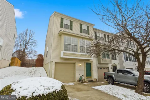 a front view of a house with a couch