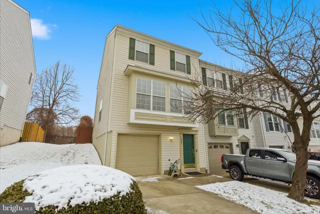 a front view of a house with a couch