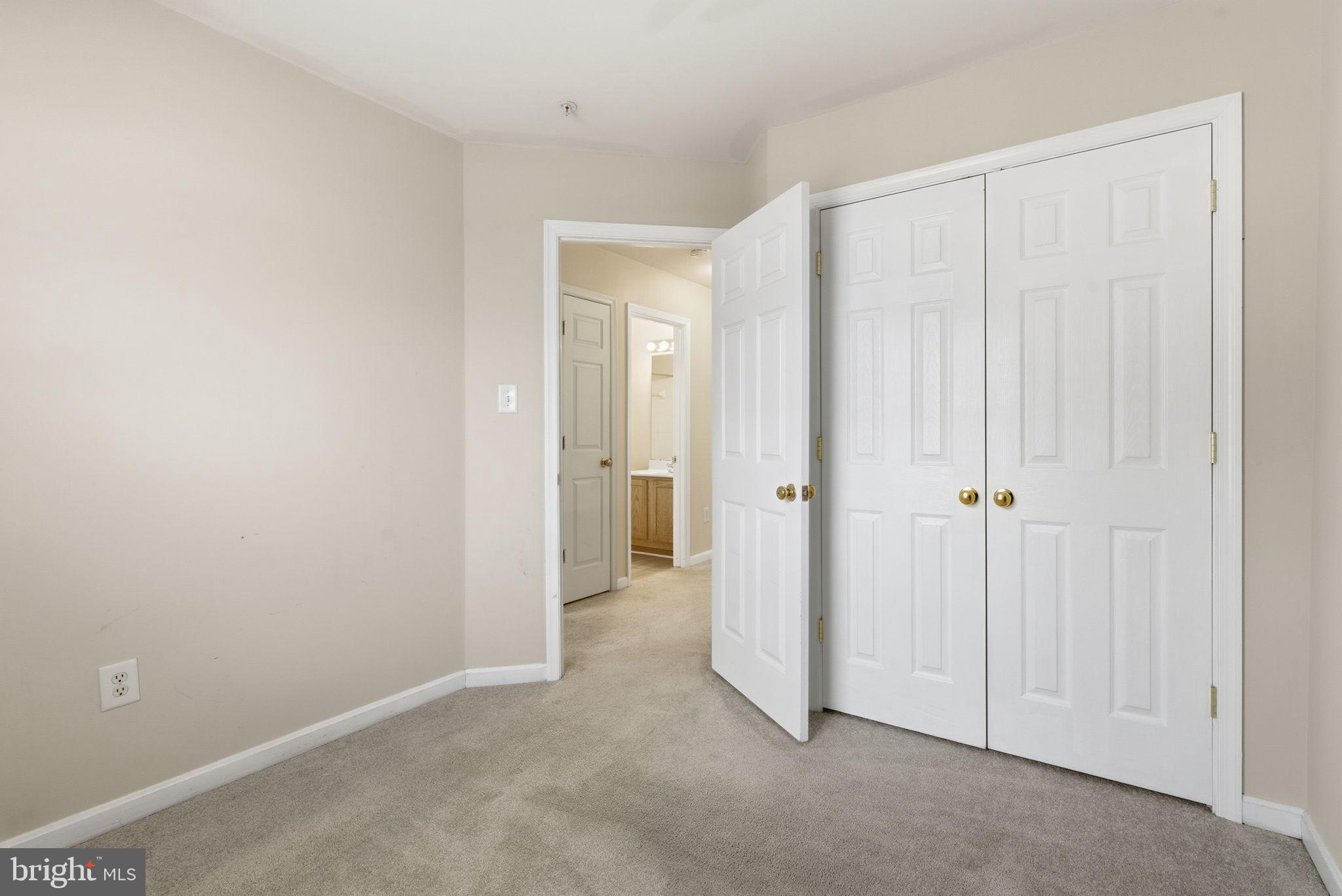 907 Vauxhall Road Landover, MD 20785 - Photo 11 of 37 a view of an empty room with closet area