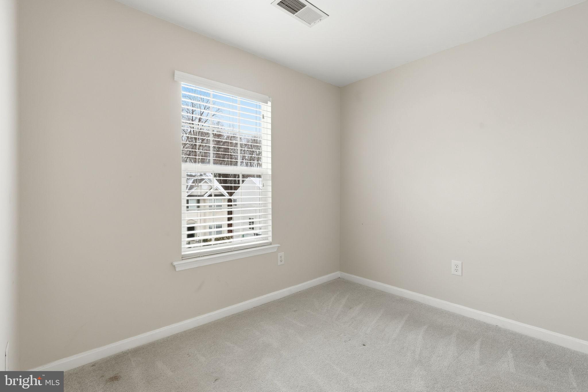 907 Vauxhall Road Landover, MD 20785 - Photo 12 of 37 an empty room with a window