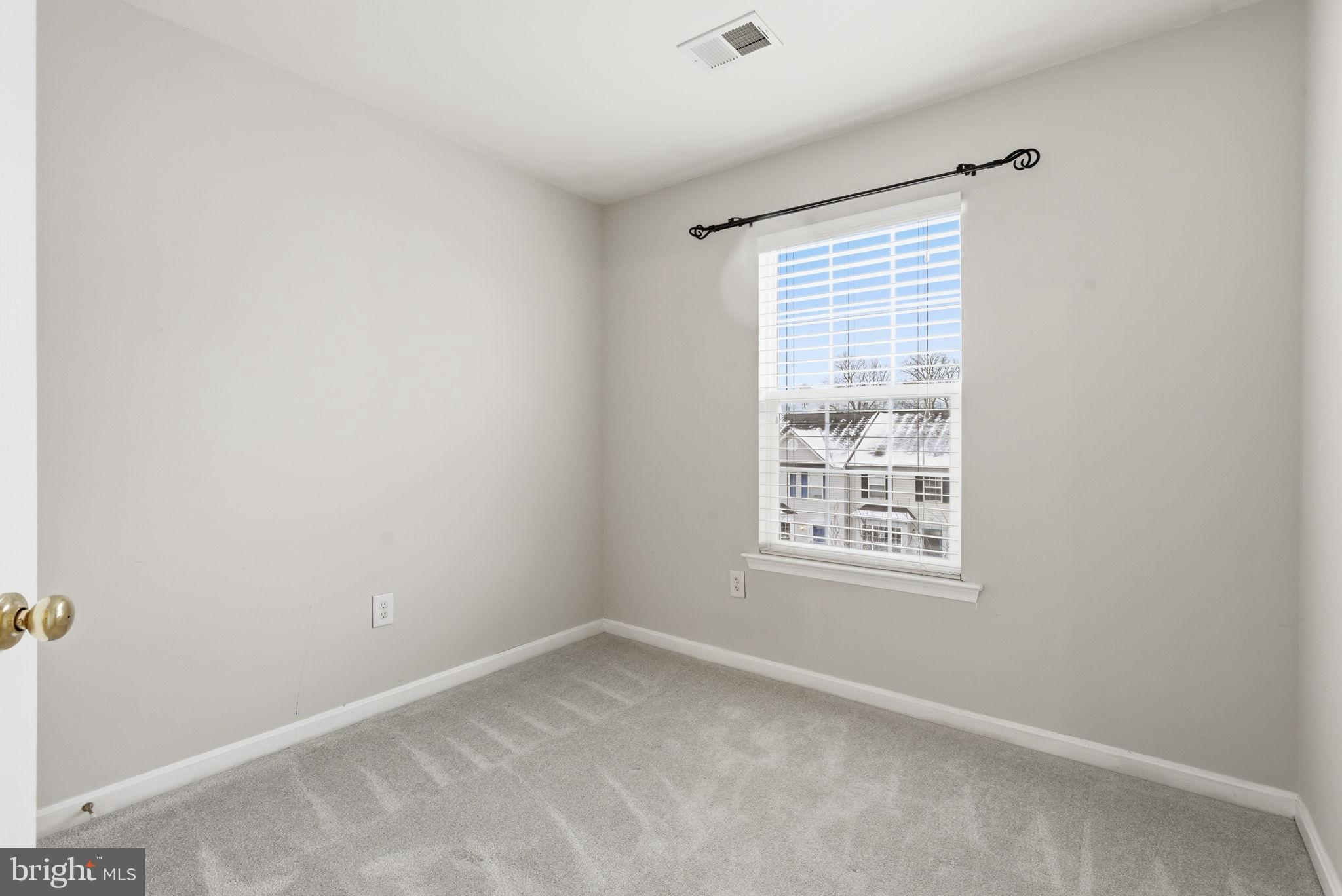 907 Vauxhall Road Landover, MD 20785 - Photo 13 of 37 an empty room with a window