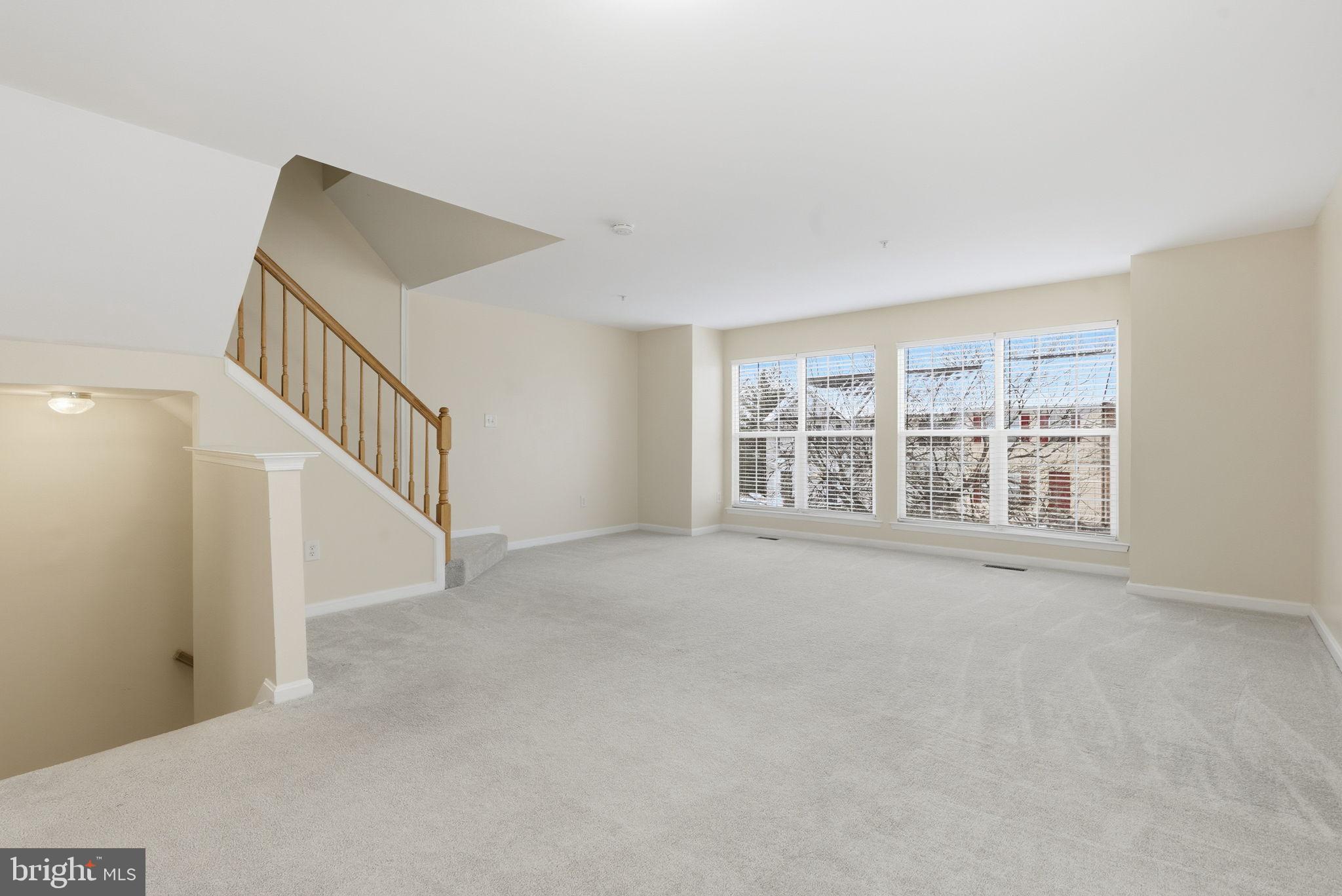 907 Vauxhall Road Landover, MD 20785 - Photo 27 of 37 a view of an empty room with stairs