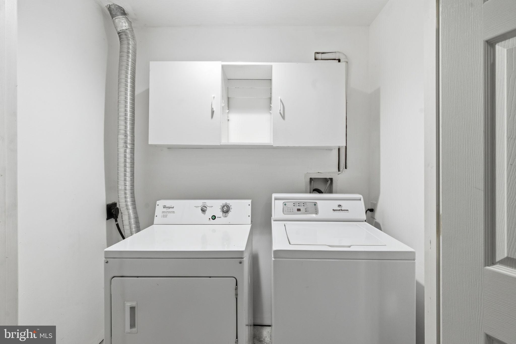 907 Vauxhall Road Landover, MD 20785 - Photo 34 of 37 a utility room with dryer and washer