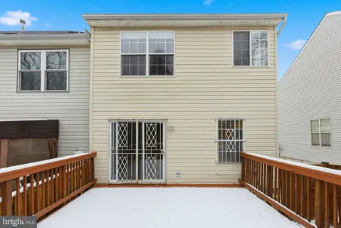 a view of front door and deck