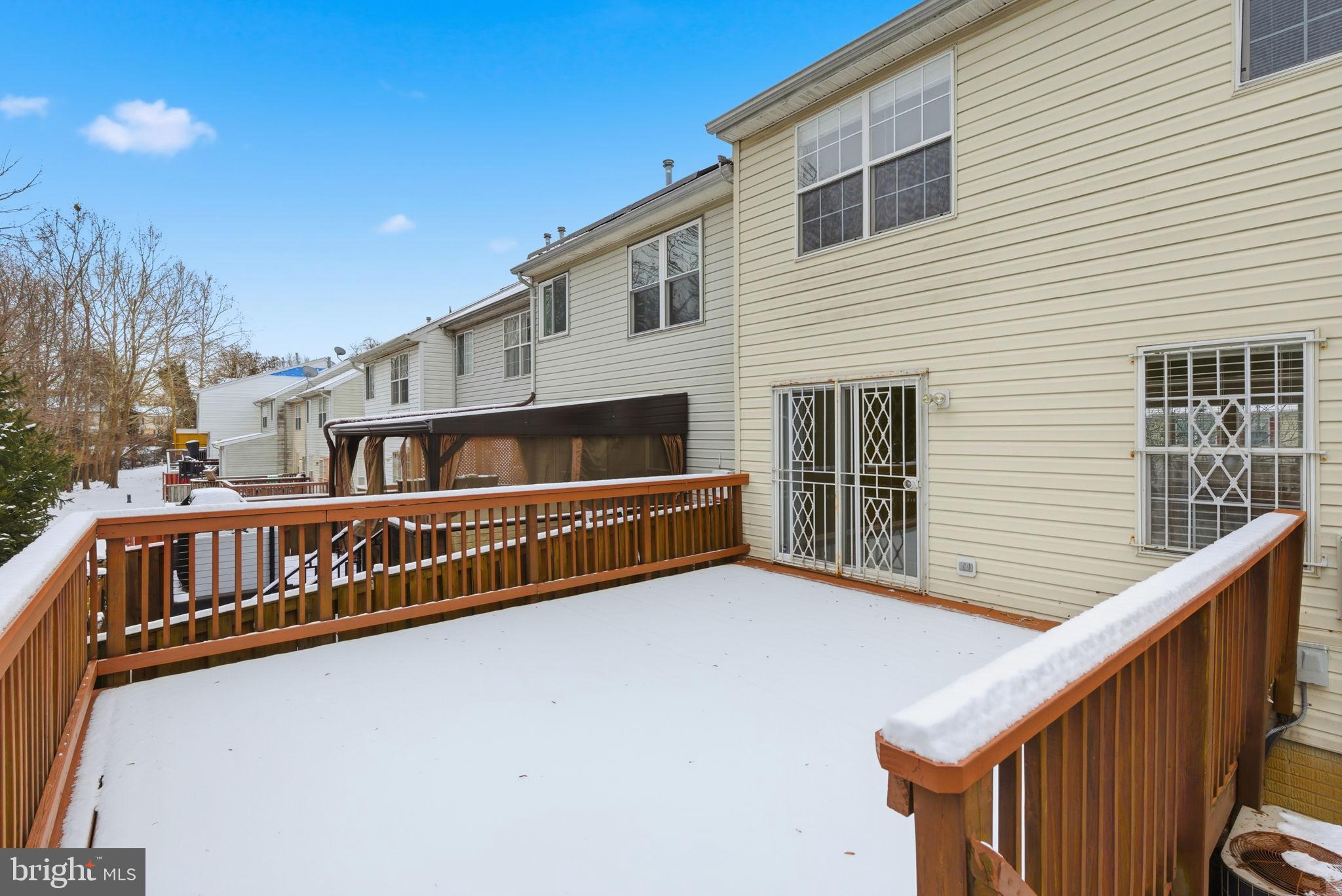 907 Vauxhall Road Landover, MD 20785 - Photo 8 of 37 a view of a house with large windows