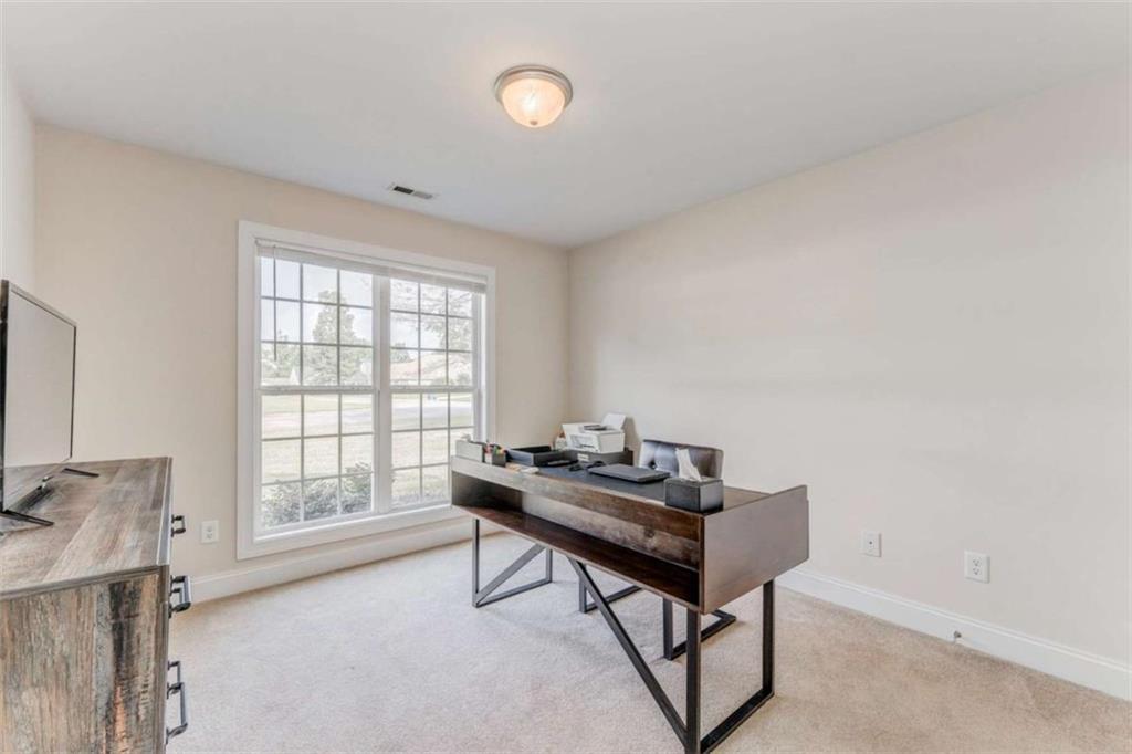 9 Royal Oak Drive Northeast Rome, GA 30165 - Photo 21 of 31 a reading room with furniture and a window