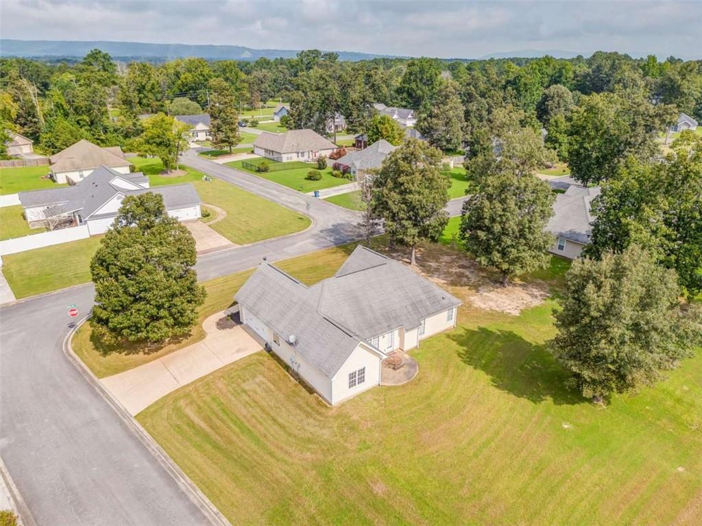 9 Royal Oak Drive Northeast Rome, GA 30165 - Photo 28 of 31 a view of a swimming pool with a yard