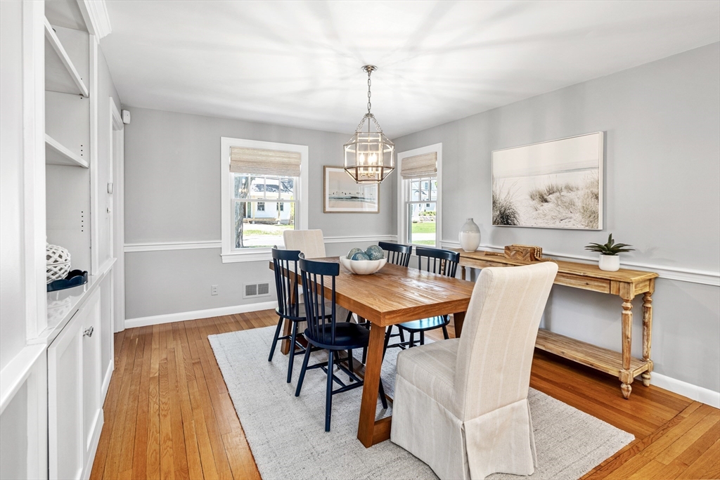 65 Bel Air Road Hingham, MA 02043 - Photo 12 of 35 a view of a a dining room with furniture window and wooden floor