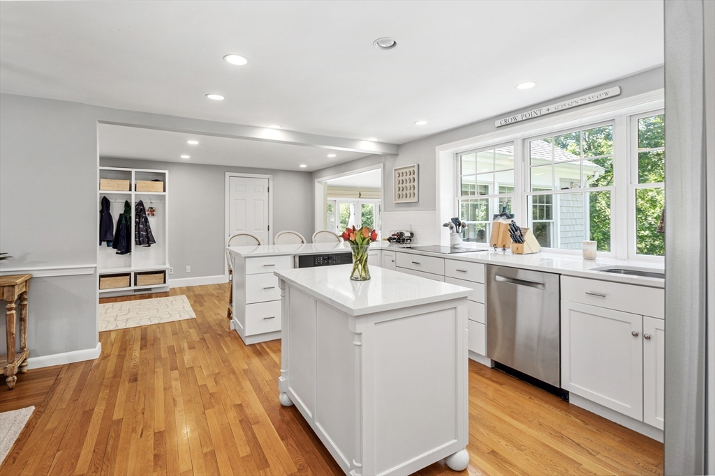 65 Bel Air Road Hingham, MA 02043 - Photo 15 of 35 a large white kitchen with sink stove and refrigerator