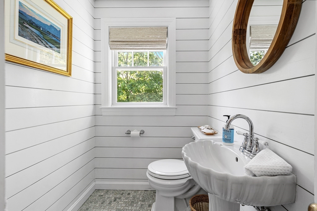 65 Bel Air Road Hingham, MA 02043 - Photo 19 of 35 a bathroom with a toilet sink and mirror