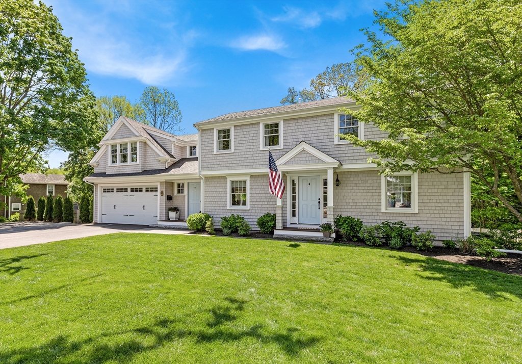 65 Bel Air Road Hingham, MA 02043 - Photo 2 of 35 a view of a house with a big yard and large trees