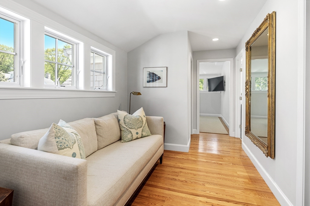 65 Bel Air Road Hingham, MA 02043 - Photo 25 of 35 a living room with furniture and a rug