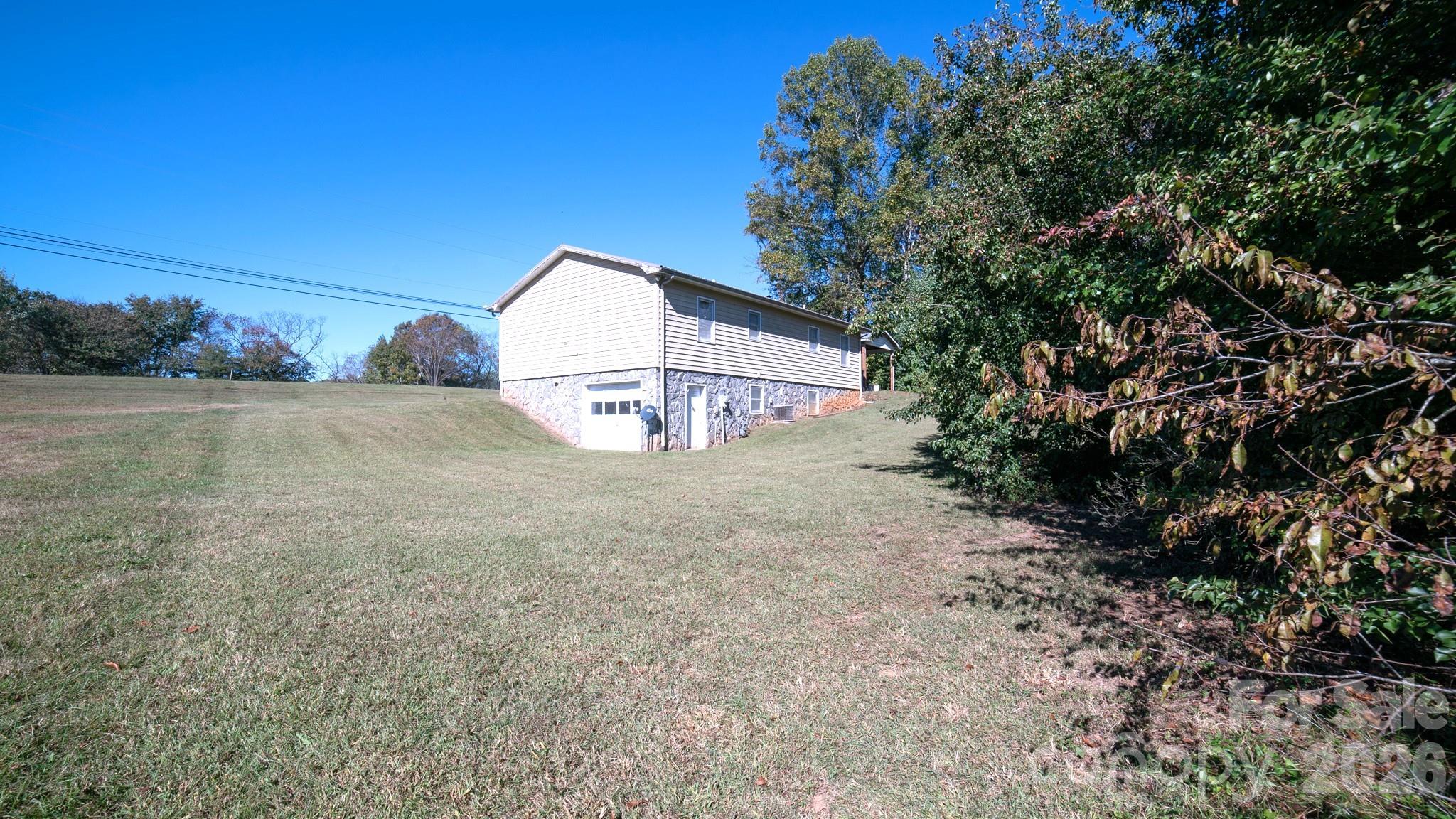 4186 Horseshoe Bend Road Hudson, NC 28638 - Photo 18 of 22 a view of a outdoor space with trees