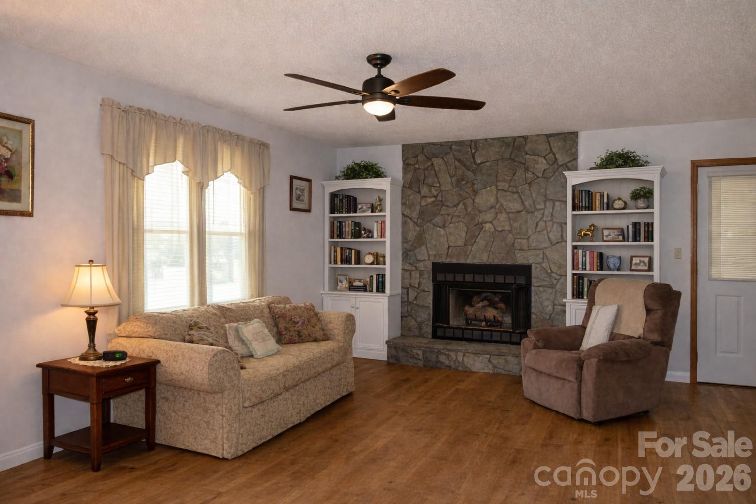 4186 Horseshoe Bend Road Hudson, NC 28638 - Photo 3 of 22 a living room with furniture and a fireplace