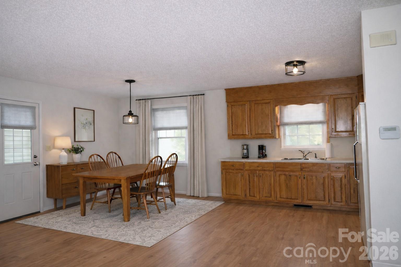 4186 Horseshoe Bend Road Hudson, NC 28638 - Photo 4 of 22 a view of a dining room with furniture and window