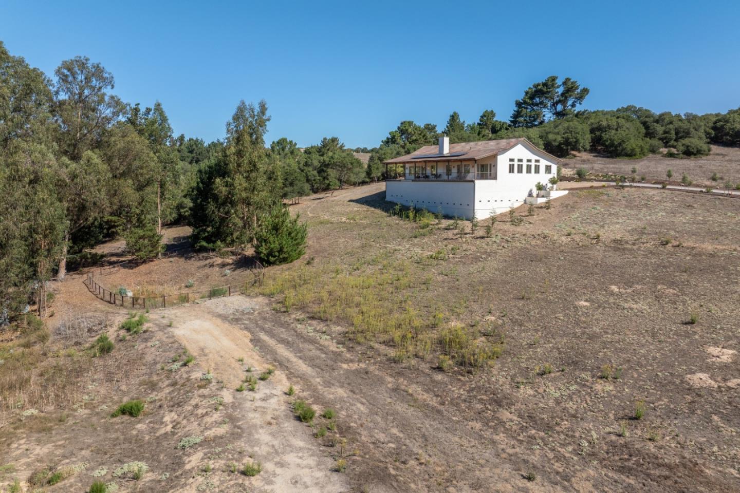 9020 Hidden Canyon Road Salinas, CA 93907 - Photo 7 of 58 a view of a dry yard with a barn