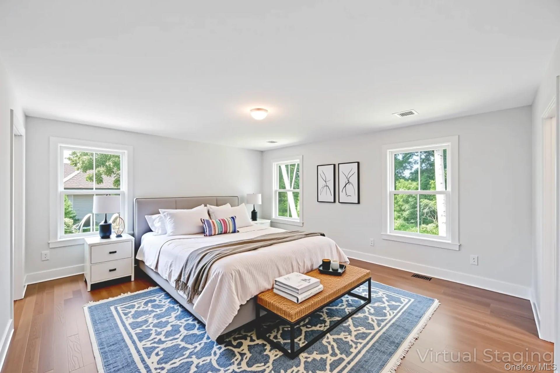 84 James Hawkins Road Moriches, NY 11955 - Photo 34 of 50 a bedroom with a bed and a window