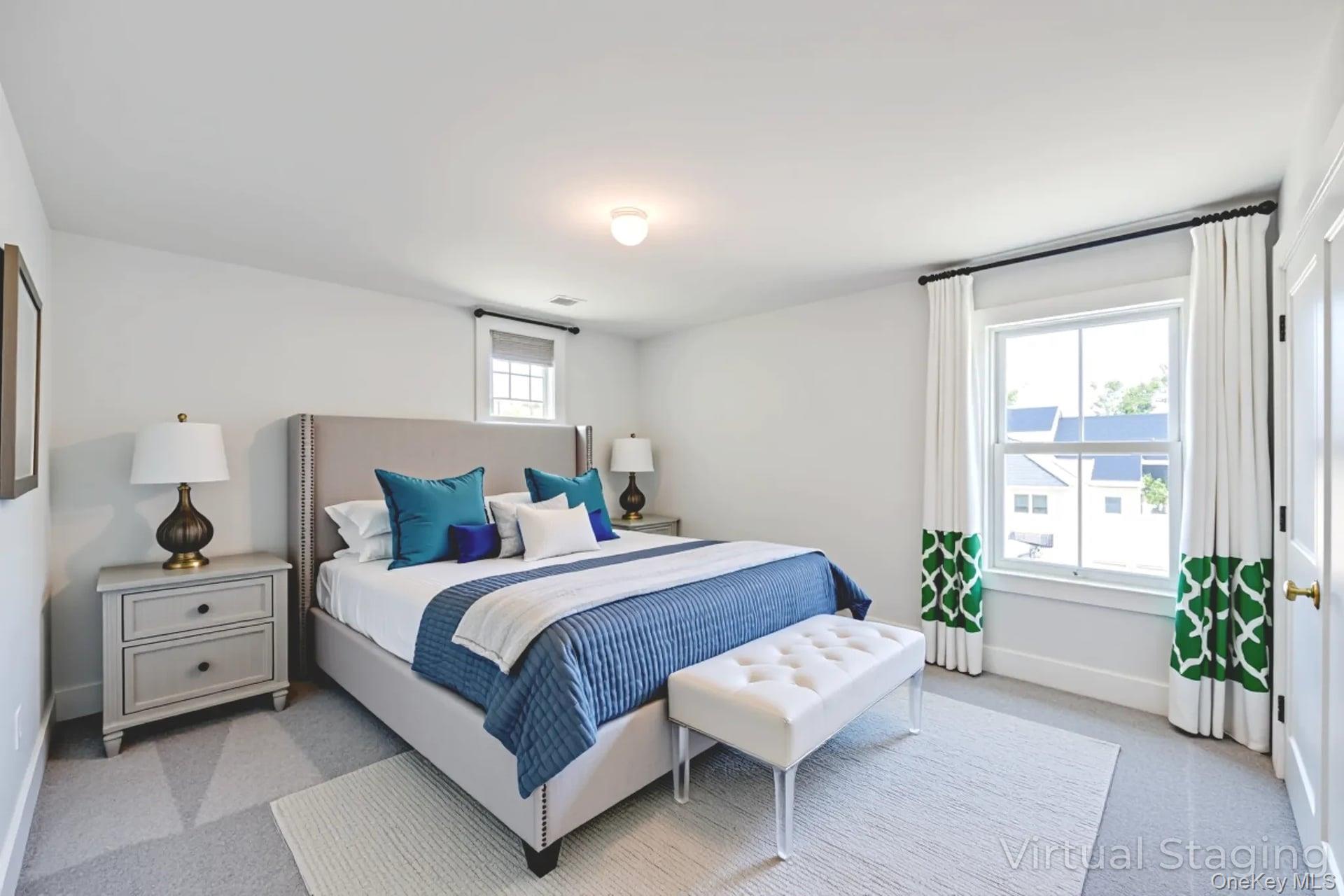 84 James Hawkins Road Moriches, NY 11955 - Photo 48 of 50 a bedroom with a bed and a potted plant