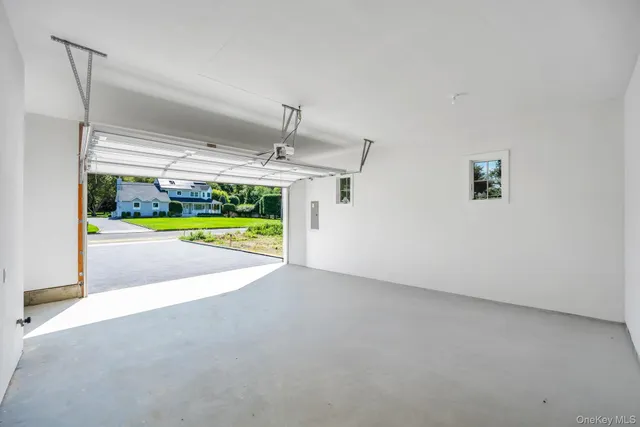 a view of a room with a yard and wooden floor