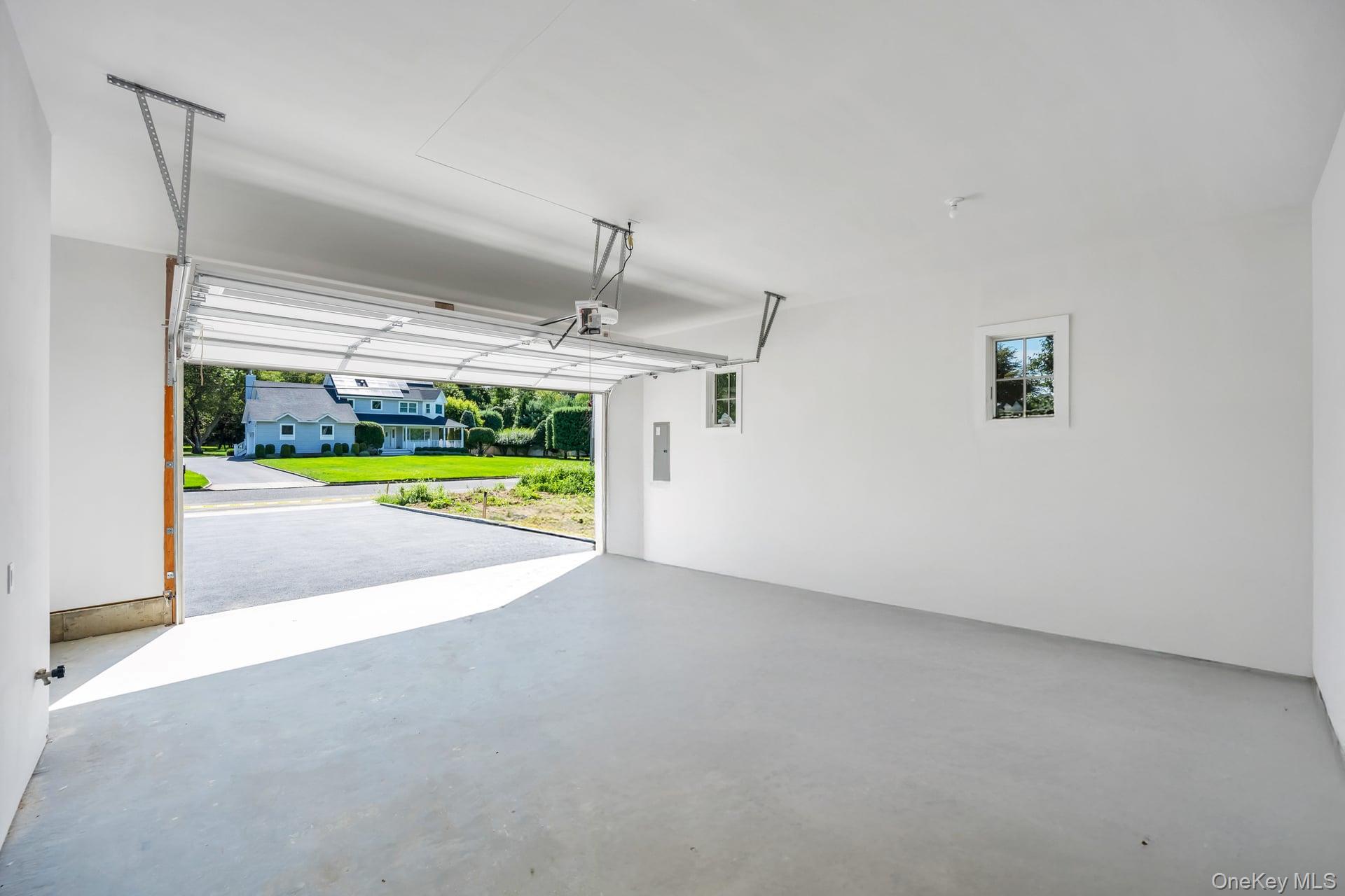 84 James Hawkins Road Moriches, NY 11955 - Photo 50 of 50 a view of a room with a yard and wooden floor