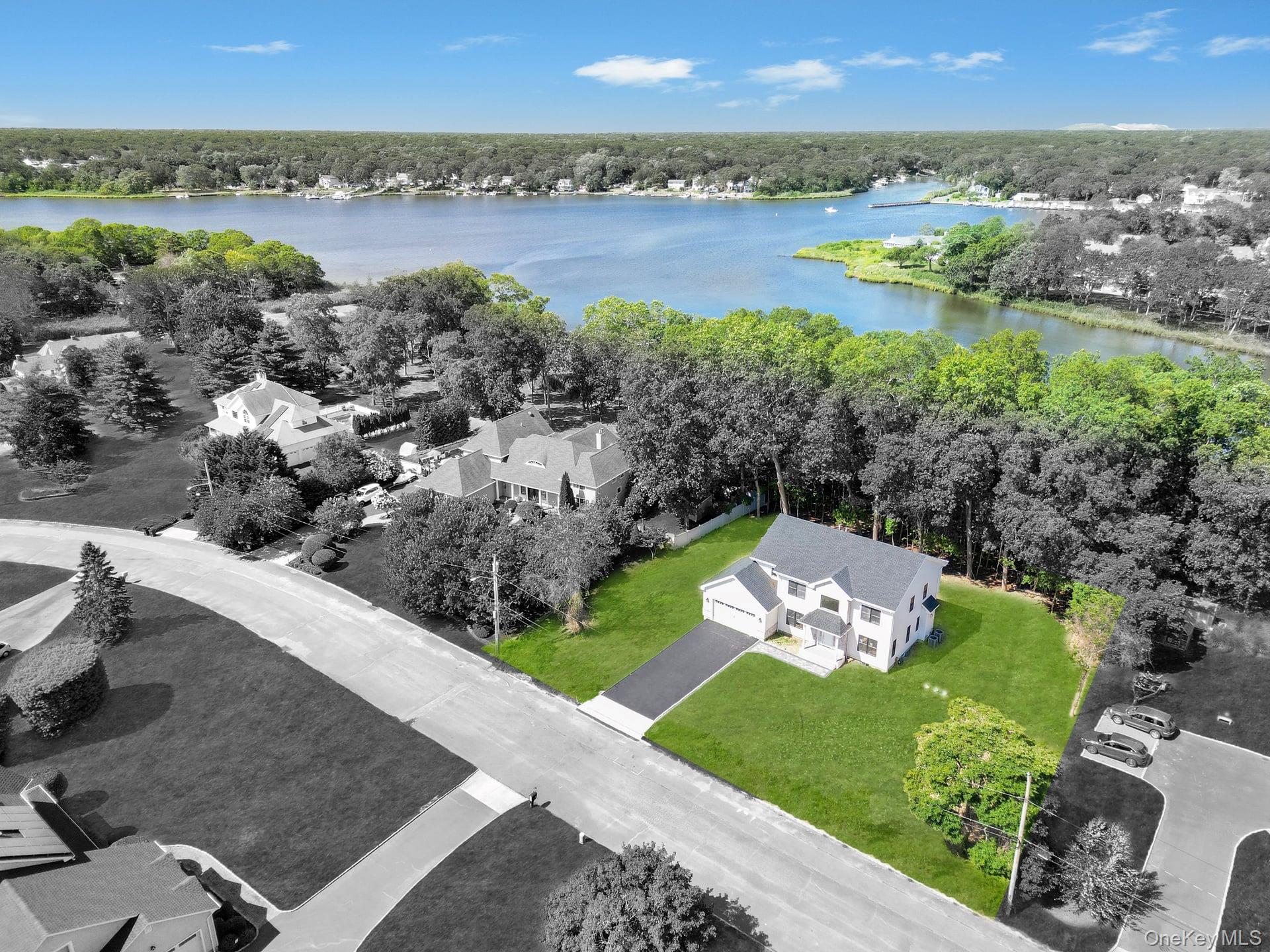 84 James Hawkins Road Moriches, NY 11955 - Photo 8 of 50 a view of a city with lake view