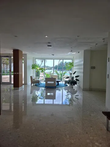 a view of a livingroom with furniture and a livingroom