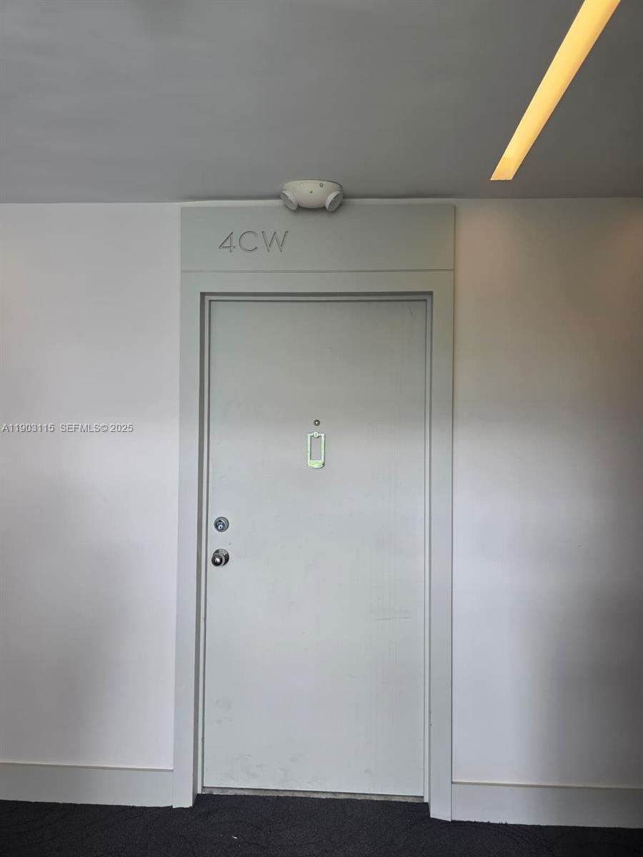 9102 West Bay Harbor Drive, Unit 4C Bay Harbor Islands, FL 33154 - Photo 8 of 26 a view of cabinets