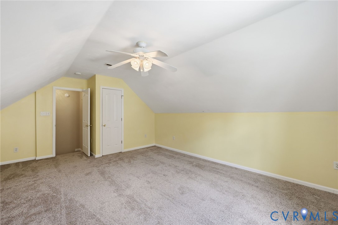 14719 Clover Ridge Lane Chesterfield, VA 23832 - Photo 30 of 36 Carpeted room featuring sloped ceilings, a ceiling