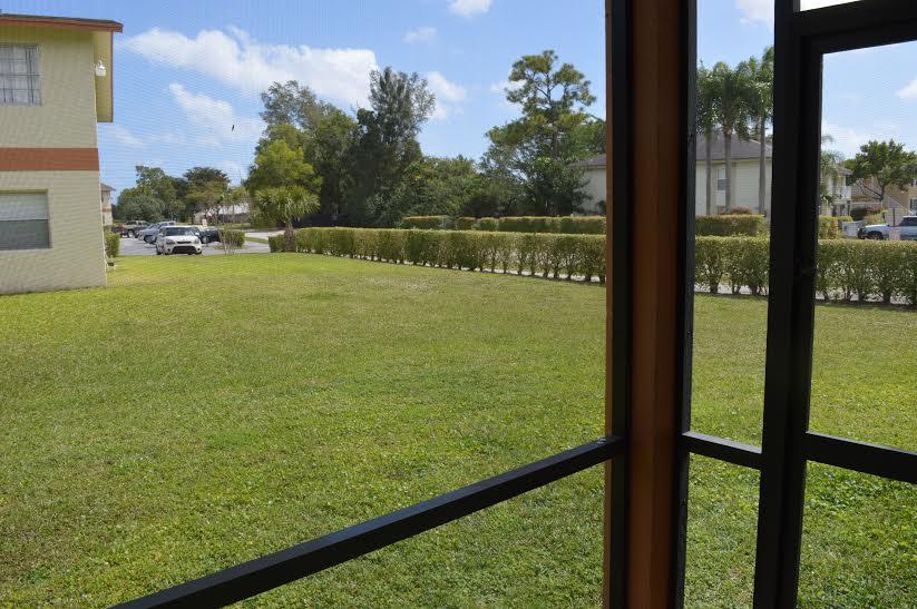 1806 Abbey Road, Unit 107 West Palm Beach, FL 33415 - Photo 4 of 12 Abbey garden