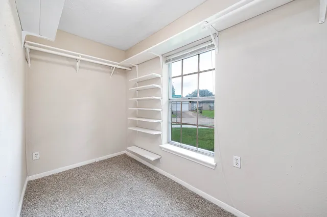 a view of a room with a window