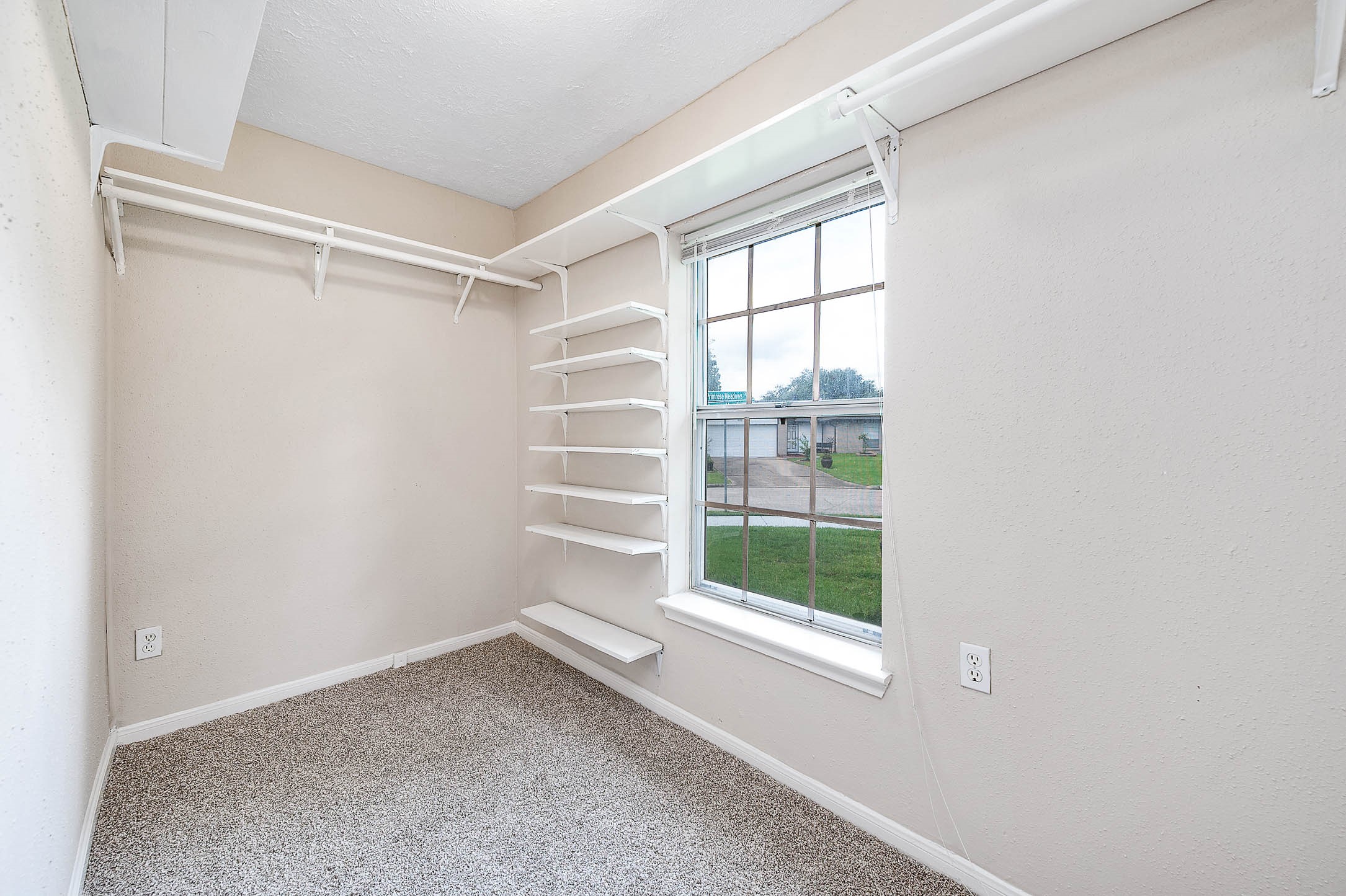 915 West Primrose Meadows Circle Pearland, TX 77584 - Photo 23 of 31 a view of a room with a window